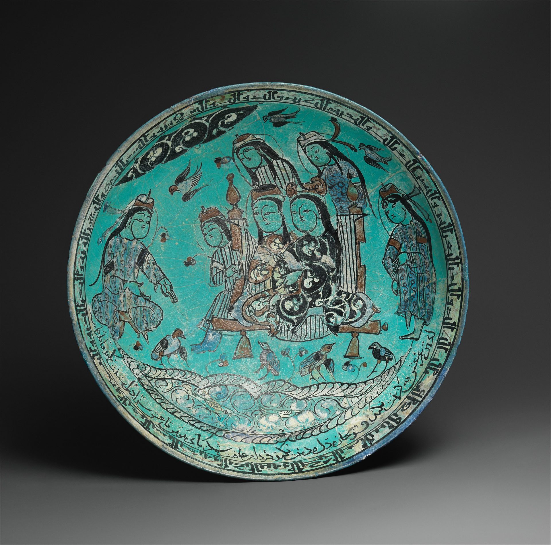 Bowl with a Majlis Scene by a Pond, Abū Zayd ibn Muḥammad ibn Abī Zayd (fl. 1186–1219), from the Metropolitan Museum of Art.